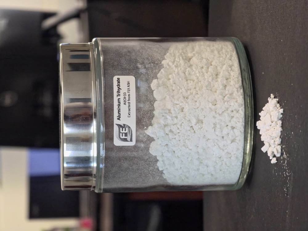 Aluminium trihydrate recovered from fly ash, in a labelled specimen jar